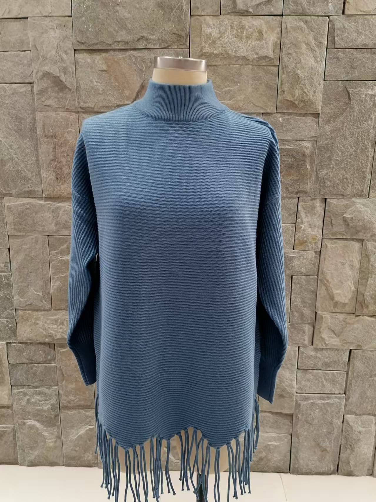 Women knitted pullover sweater with tassels